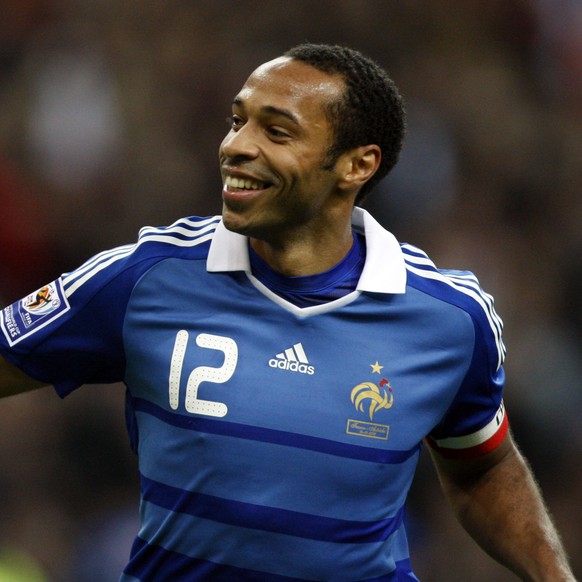 FILE - In this Wednesday Oct. 14, 2009 file photo, France's Captain Thierry Henry celebrates after scoring a penalty against Austria during their World Cup 2010 qualifying soccer match at Stade d ...