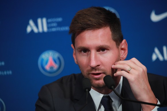 epa09409422 Argentinian striker Lionel Messi during his press conference as part of his official presentation at the Parc des Princes stadium, in Paris, France, 11 August 2021. Messi arrived in Paris ...