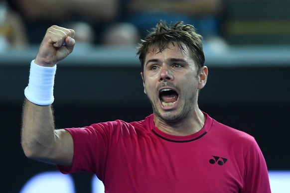 epa05721485 Stan Wawrinka of Switzerland celebrates his match win against Martin Klizan of Slovakia during their Men&#039;s Singles first round match of the Australian Open Grand Slam tennis tournamen ...