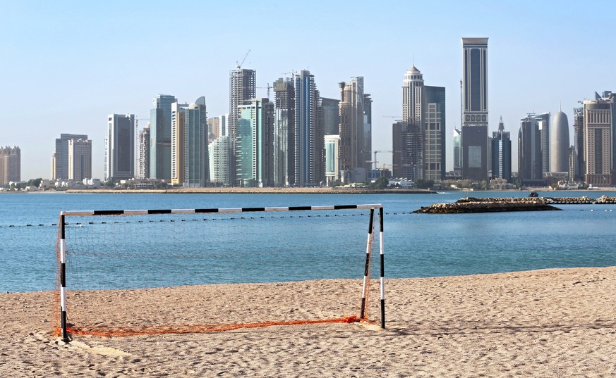 epa07655128 (FILE) - A football goal at a beach in front of the skyline of Doha, Qatar, 21 April 2015 (re-issued 18 June 2019). Former UEFA president Michel Platini has been arrested as part of an inv ...