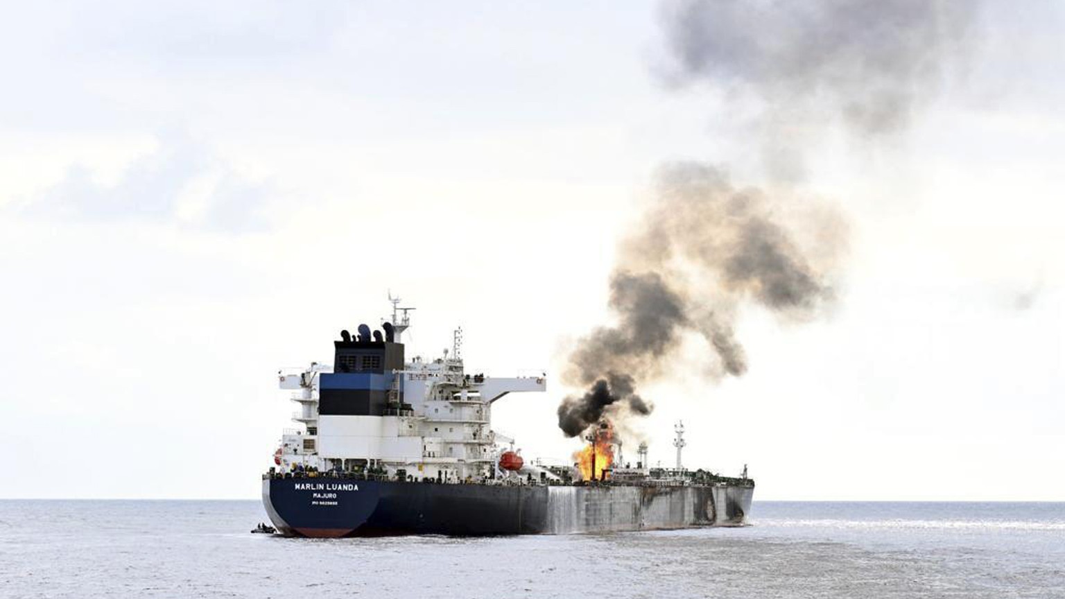 CAPTION CORRECTS LOCATION TO GULF OF ADEN In this photo provided by the Indian Navy on Saturday, Jan. 27, 2024, a view of the oil tanker Marlin Luanda on fire after an attack, in the Gulf of Aden. The ...