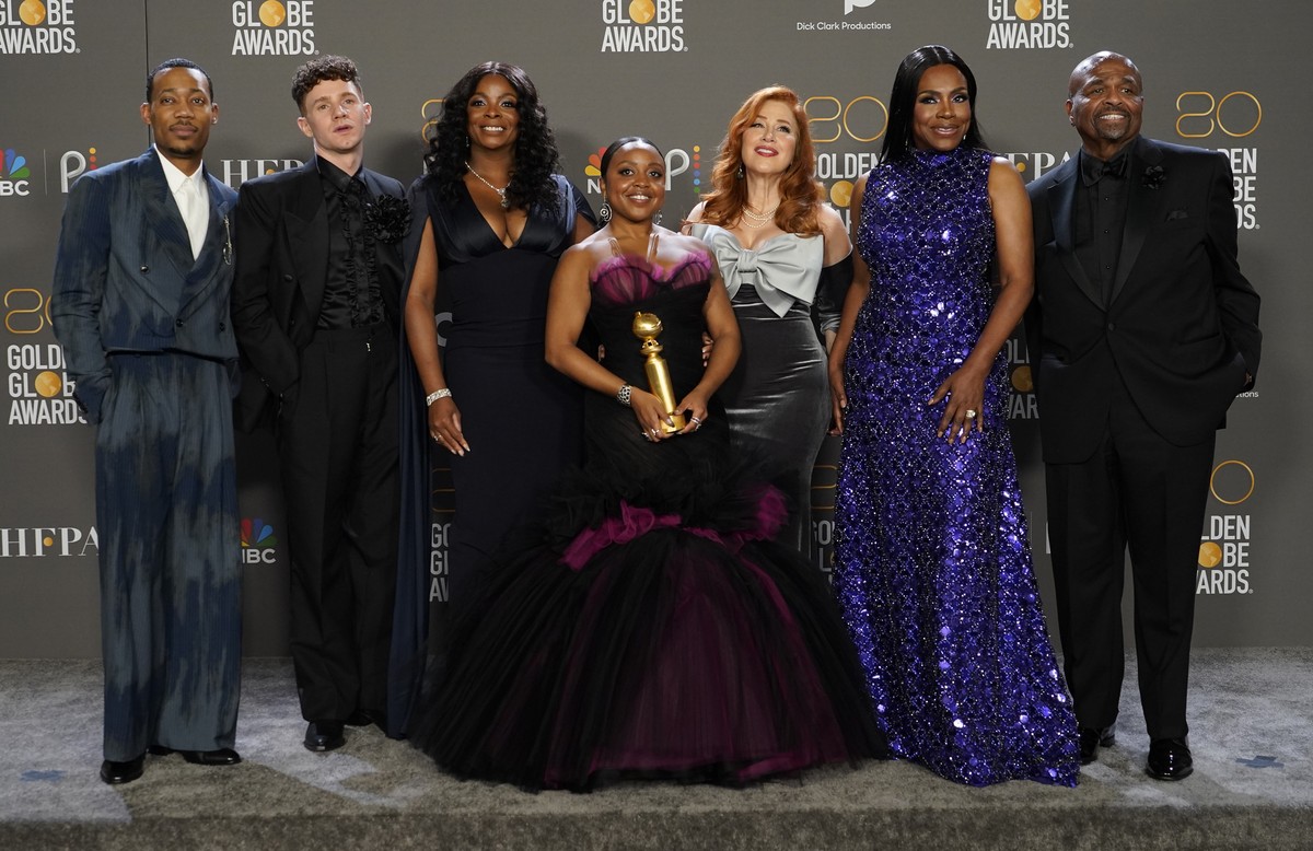 Tyler James Williams, from left, Chris Perfetti, Janelle James, Quinta Brunson, Lisa Ann Walter, Sheryl Lee Ralph and William Stanford Davis pose in the press room with the award for best television s ...