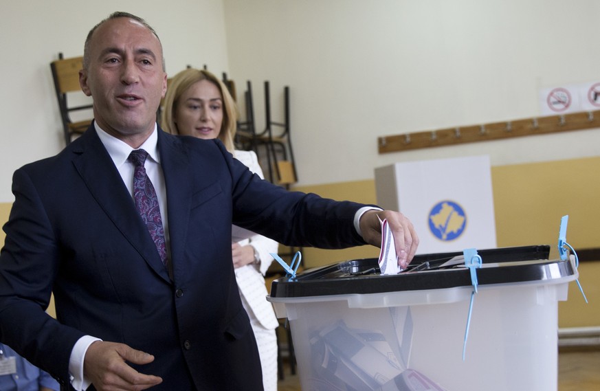 FILE - In this Sunday, June 11, 2017 file photo, Ramush Haradinaj, candidate for Prime Minister, casts his ballot during the early parliamentary elections Pristina, Kosovo. KosovoÄôs prime minister h ...