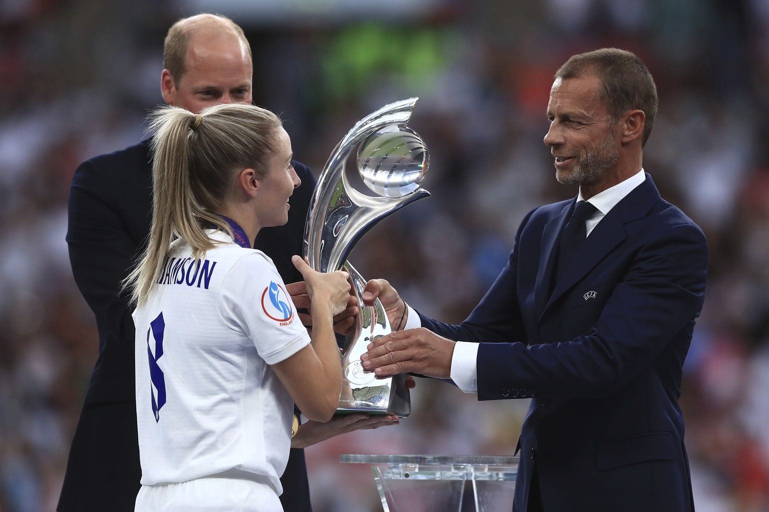 England&#039;s Leah Williamson receives the trophy next to Britain&#039;s Prince William after the Women&#039;s Euro 2022 final soccer match between England and Germany at Wembley stadium in London, S ...