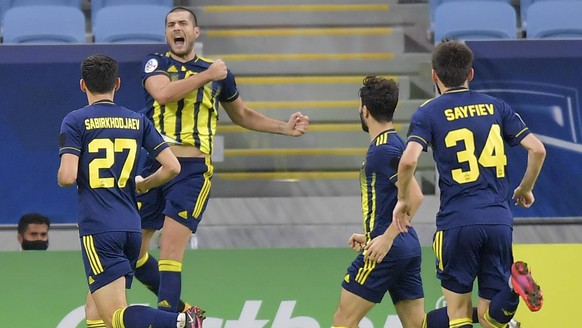 200927 -- DOHA, Sept. 27, 2020 -- Eren Derdiyok 2nd L of Pakhtakor celebrates with his teammates after scoring a goal during the AFC Asian Champions League round of 16 match between Pakhtakor of Uzbek ...