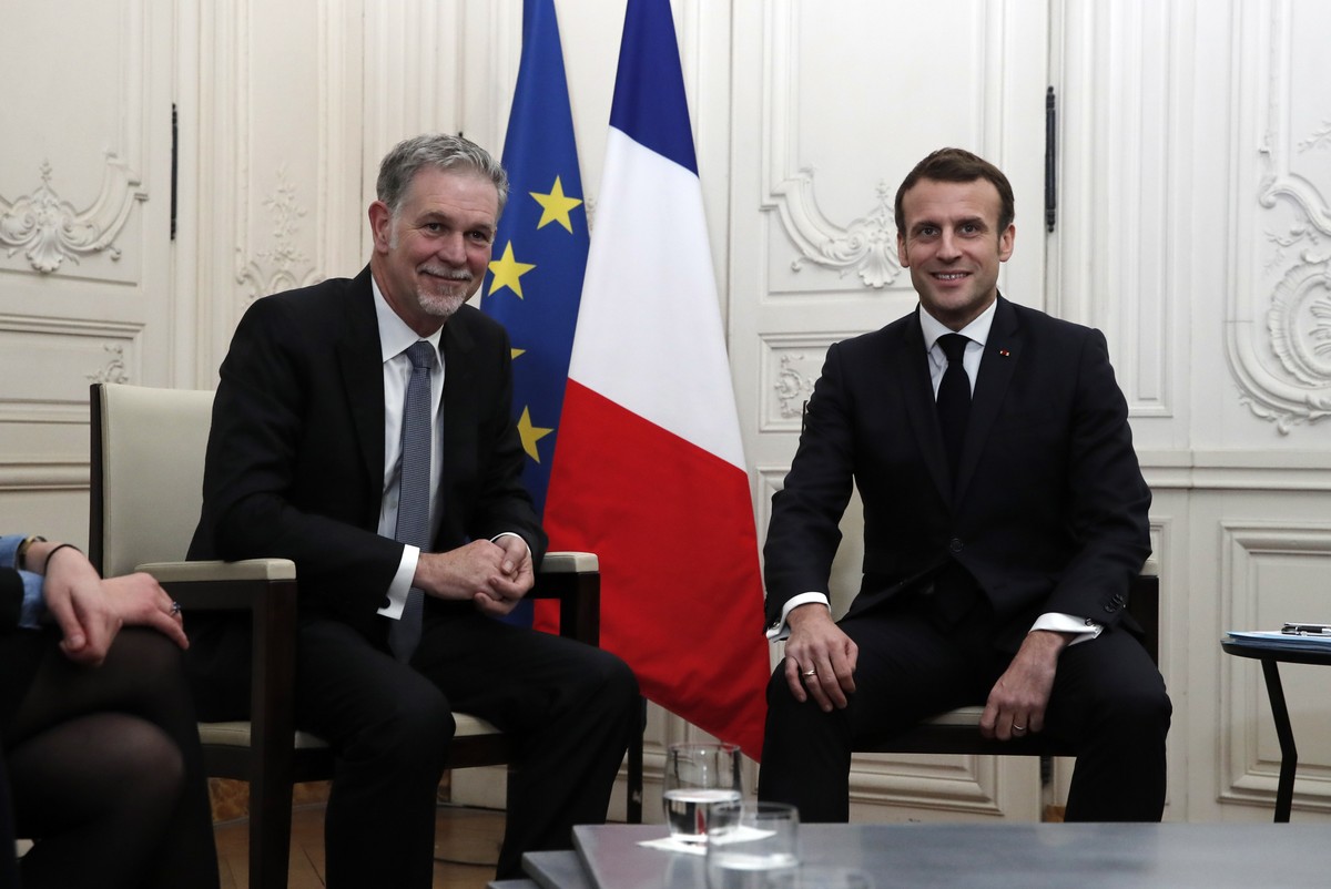 epa08145127 France's President Emmanuel Macron attends a meeting with Reed Hastings, co-founder and CEO of Netflix, during the Choose France summit at the Chateau de Versailles, outside Paris, Fr ...
