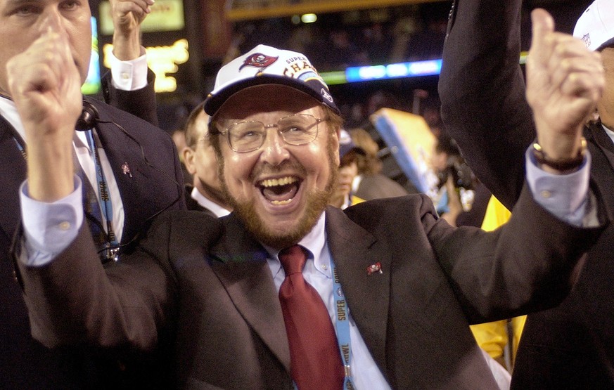 FILE - In this Jan. 26, 2003 file photo, Tampa Bay Buccaneers owner Malcolm Glazer celebrates the Bucs' 48-21 victory over the Oakland Raiders in Super Bowl XXXVII in San Diego. Glazer, the self-made  ...