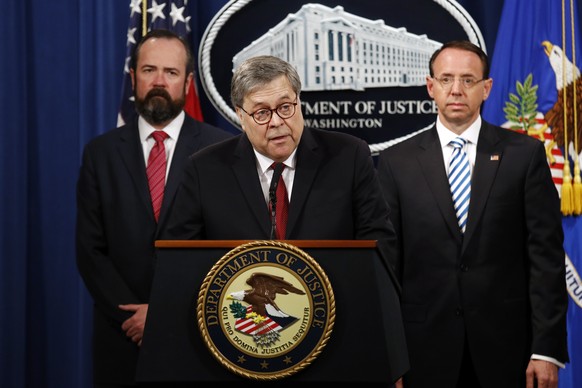 Attorney General William Barr speaks alongside Deputy Attorney General Rod Rosenstein, right, and Deputy Attorney General Ed O'Callaghan, left, about the release of a redacted version of special ...