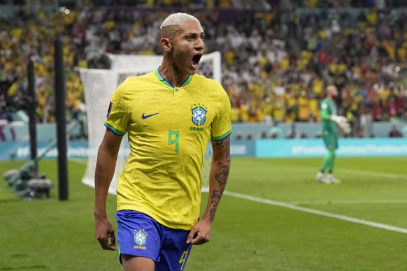 Brazil&#039;s Richarlison celebrates after scoring the opening goal during the World Cup group G soccer match between Brazil and Serbia, at the Lusail Stadium in Lusail, Qatar, Thursday, Nov. 24, 2022 ...