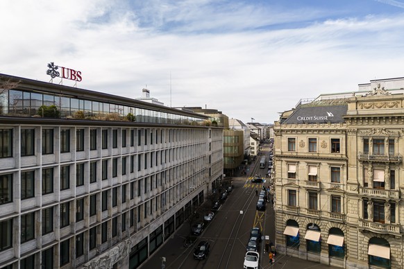epa10530314 A general view shows the headquarters of the Swiss bank Credit Suisse (R) and UBS (L) at Paradeplatz in Zurich, Switzerland, 18 March 2023. Shares of Credit Suisse lost more than one-quart ...