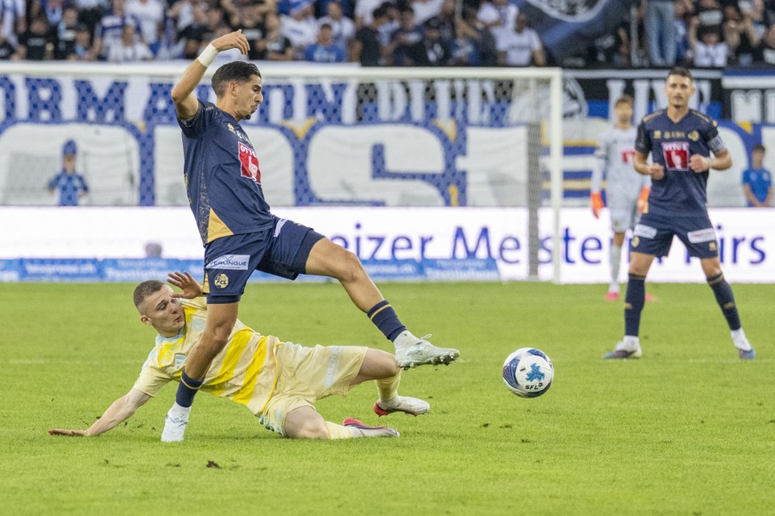 Ruben Fernandes, oben, von Luzern im Spiel gegen Samuel Krasniqi, unten, von GC beim Super League Meisterschaftsspiel zwischen dem FC Luzern und den Grasshoppers Zuerch vom Samstag, 19. September 2026 ...