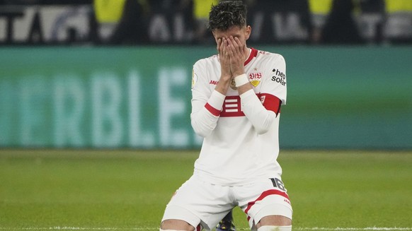 Stuttgart&#039;s Atakan Karazor celebrates after winning the trophy in the German soccer cup, DFB Pokal, final match between Arminia Bielefeld and VfB Stuttgart at Olympiastadion in Berlin, Germany, S ...