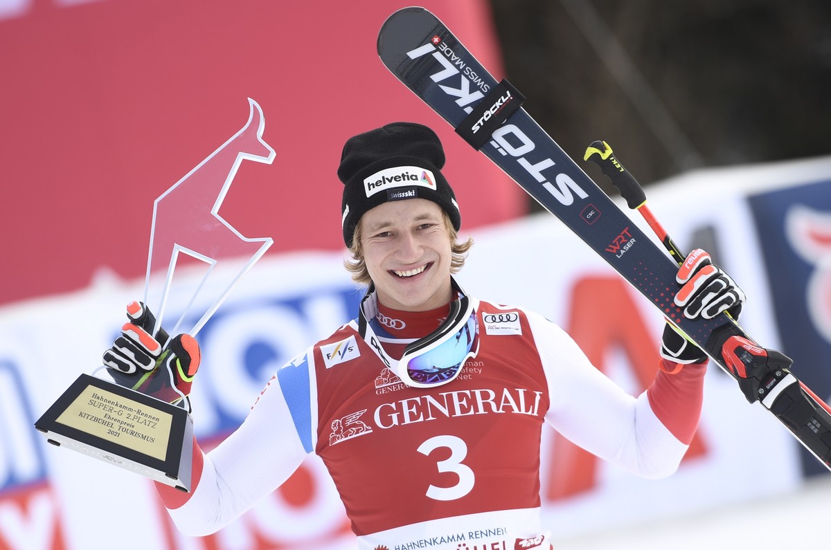 epa08963929 Second placed Marco Odermatt of Switzerland celebrates after the men's Super G race of the FIS Alpine Skiing World Cup event in Kitzbuehel, Austria, 25 January 2021. EPA/CHRISTIAN BRU ...
