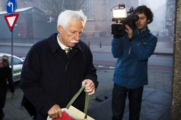 epa04487726 Former Dutchbat commander Thom Karremans arrives at the court in Arnhem, The Netherlands, 13 November 2014. Karremans must defend himself against accusations that he was an accessory to mu ...