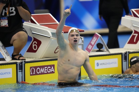 Leon Marchand, of France, reacts after competing in the men&#039;s 400m individual medley final at the World Swimming Championships in Fukuoka, Japan, Sunday, July 23, 2023. Marchand set a new world r ...