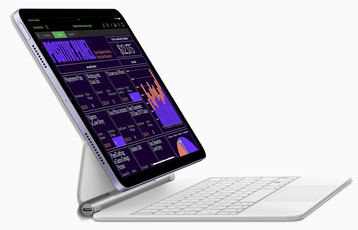 epa09810998 A handout photo made available by Apple shows the Magic Keyboard and the new iPad Air that comes in a stunning array of colors, and features, the Apple-designed M1 chip, a new Ultra Wide f ...