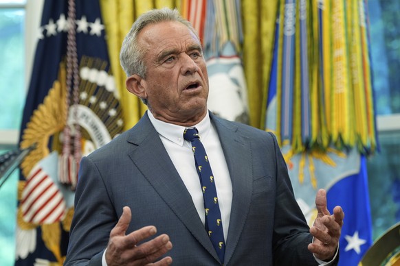 Health and Human Services Secretary Robert F. Kennedy Jr. speaks during an event with President Donald Trump to sign executive orders and proclamations in the Oval Office of the White House, Monday, M ...