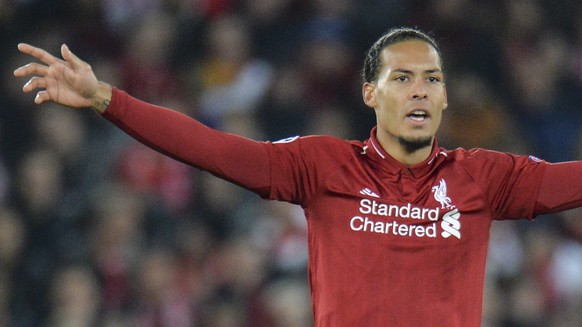 epa07495146 Liverpool&#039;s Virgil van Dijk reacts during the UEFA Champions League quarter final, first leg soccer match between Liverpool FC and FC Porto at Anfield in Liverpool, Britain, 09 April  ...