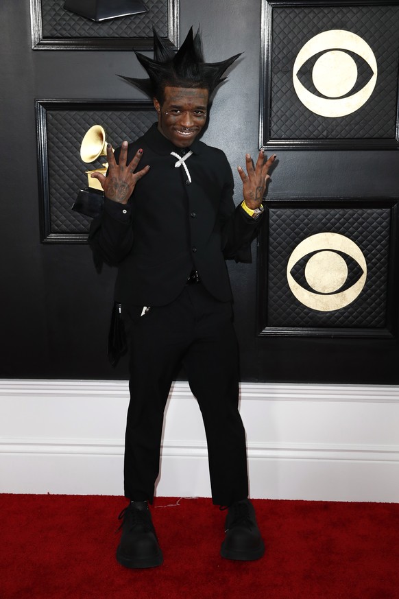 epa10450198 Lil Uzi Vert arrives for the 65th annual Grammy Awards at the Crypto.com Arena in Los Angeles, California, USA, 05 February 2023. EPA/CAROLINE BREHMAN