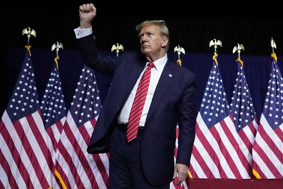 Republican presidential candidate former President Donald Trump gestures at a campaign rally Saturday, March 9, 2024, in Rome Ga. (AP Photo/Mike Stewart)