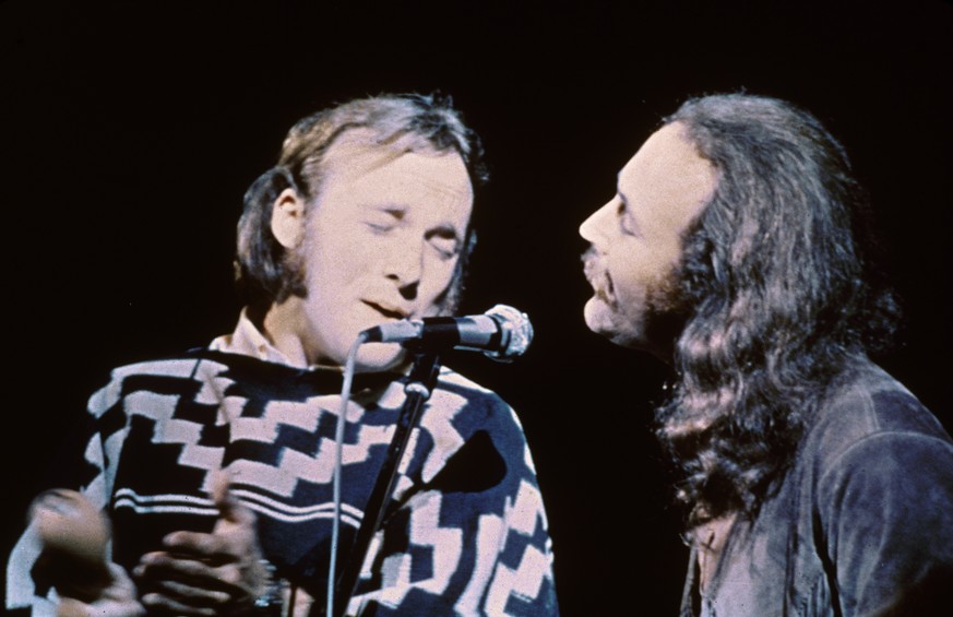 American musicians Stephen Stills (left) and David Crosby of the group Crosby, Stills, &amp; Nash performs on stage at the Woodstock Music and Art Festival, Bethel, New York, August 17, 1969. (Photo b ...