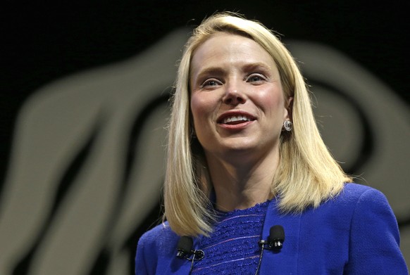 HOLD FOR RELEASE UNTIL 6:00 A.M. EDT. THIS PHOTO MAY NOT BE PUBLISHED, BROADCAST OR POSTED ONLINE BEFORE 6:00 A.M. EDT - FILE - In this Tuesday, June 17, 2014, file photo, Yahoo CEO Marissa Mayer atte ...