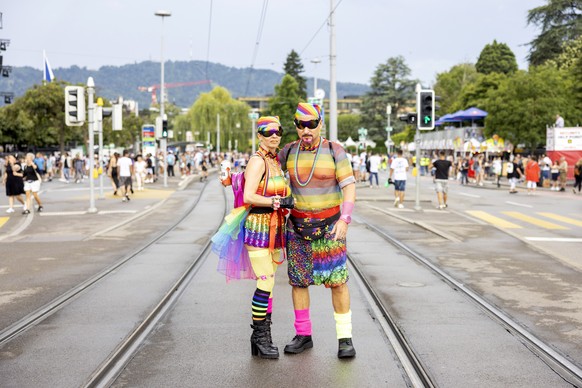 epa10796649 Dressed up participants pose during the 30th Street Parade in the city center of Zurich, Switzerland, 12 August 2023. The annual dance music event Street Parade runs this year under the th ...