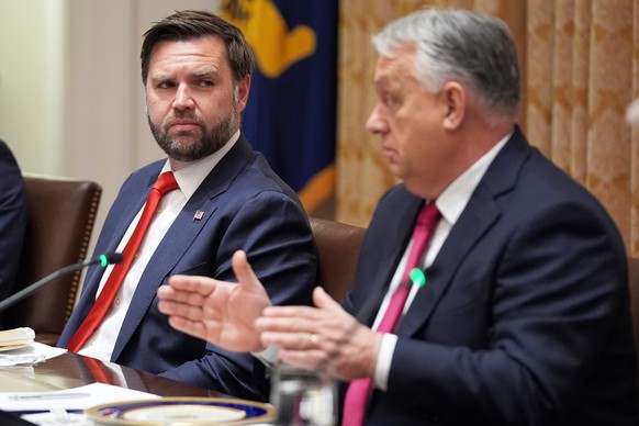 FILE - Vice President JD Vance, left, listens as Hungary's Prime Minister Viktor Orban speaks during a meeting in the Cabinet Room of the White House, Friday, Nov. 7, 2025, in Washington. (AP Pho ...