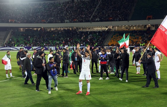 epa11988227 Mehdi Tarmi and rest of the players of Iran celebrate after the FIFA World Cup 2026 qualification match between Iran and Uzbekistan in Tehran, Iran, 25 March 2025. Iran qualified for the 2 ...