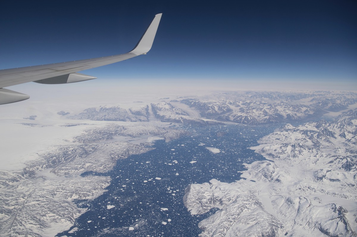 Areas of ice are seen as the airplane carrying U.S. Secretary of State Antony Blinken approaches Kangerlussuaq Airport in Greenland, Thursday, May 20, 2021. Blinken traveled to Greenland for a brief v ...