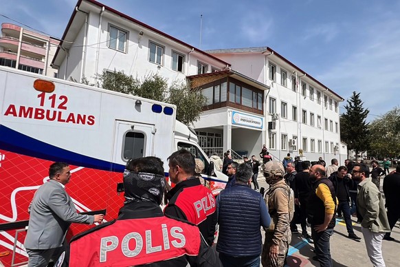 Turkish security forces and emergency staff stand in the courtyard of a secondary school where an assailant opened fire, in Kahramanmaras, Turkey, Wednesday, April 15, 2026, (IHA via AP)
Turkey School ...