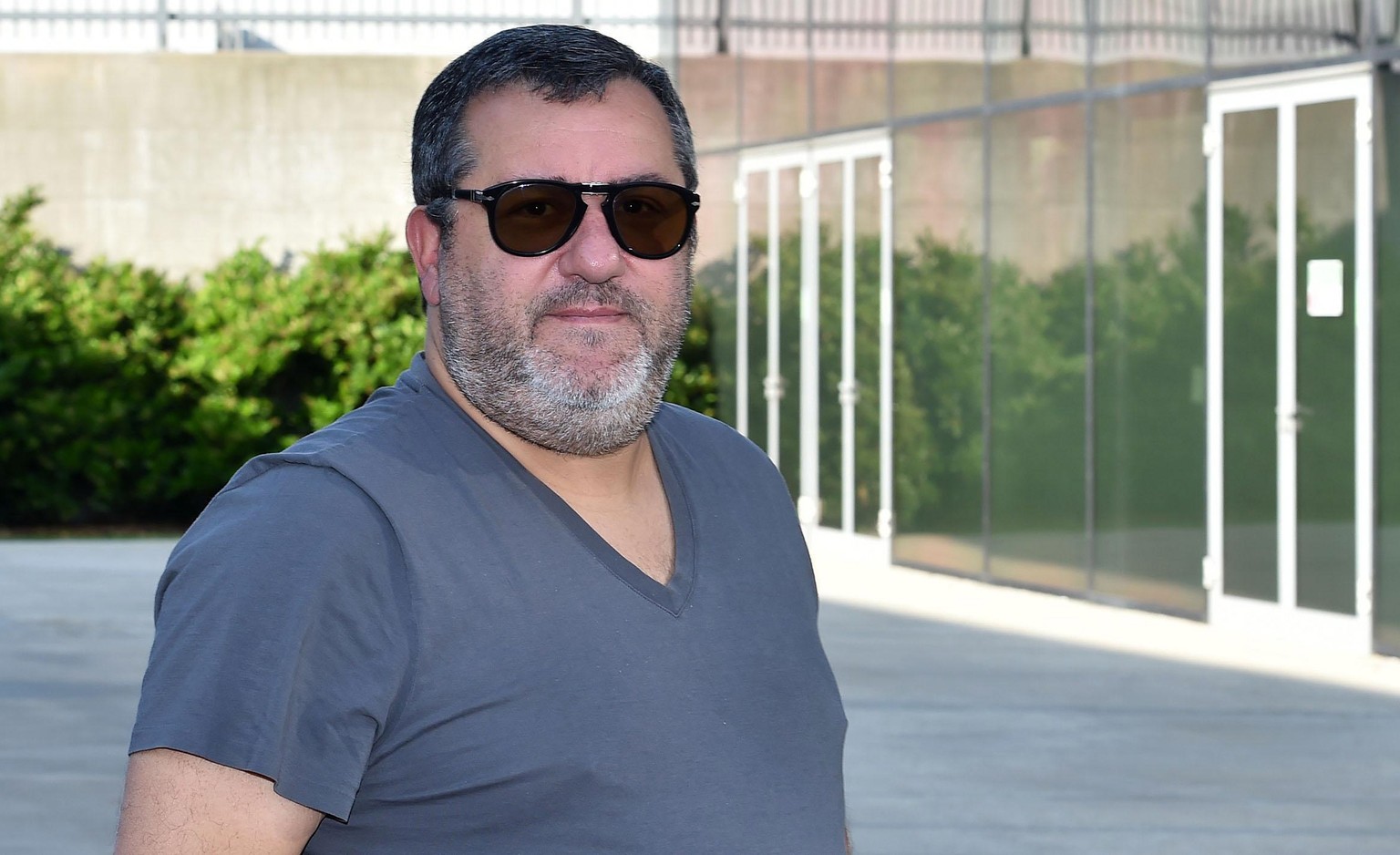 epa07721686 Italian-born Dutch soccer agent Mino Raiola arrives at Juventus Medical Center in Turin, Italy, 17 July 2019. Raiola accompanied his client Dutch defender Matthijs de Ligt who is undergoin ...