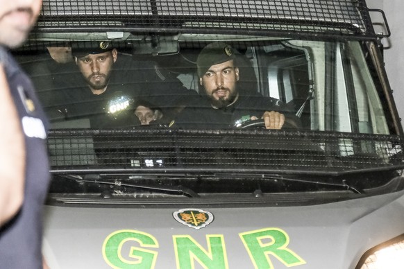 epa12985784 A National Republican Guard (GNR) van transports French national Marine Rousseau near Setubal Judicial Court in Setubal, Portugal, 22 May 2026. Rousseau and a 55-year-old man were arrested ...