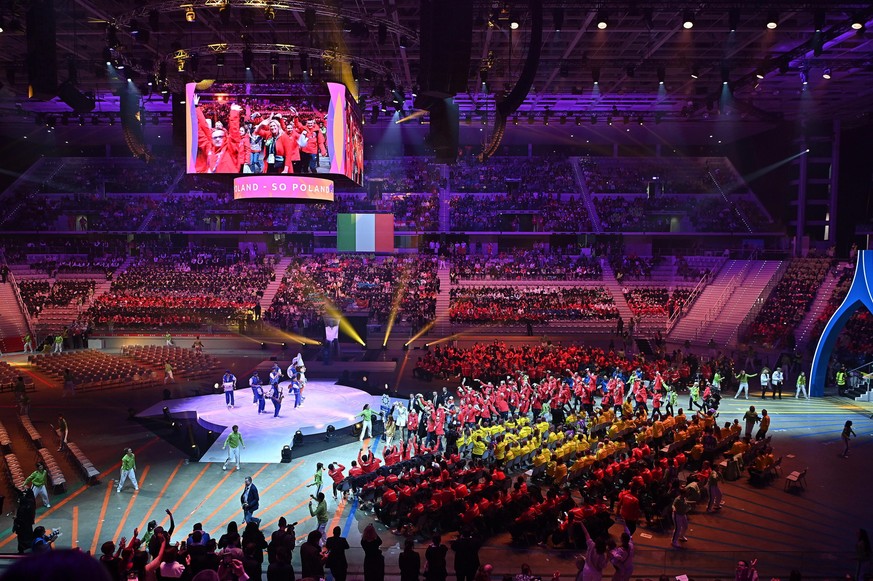 epa11949908 Athletes enter during opening ceremony of the 2025 Special Olympics World Winter Games, in Turin, Italy, 08 March 2025. EPA/ALESSANDRO DI MARCO