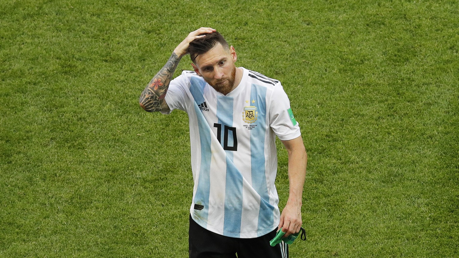 epa06852430 Lionel Messi of Argentina leaves the pitch after the FIFA World Cup 2018 round of 16 soccer match between France and Argentina in Kazan, Russia, 30 June 2018. France won 4-3.

(RESTRICTI ...