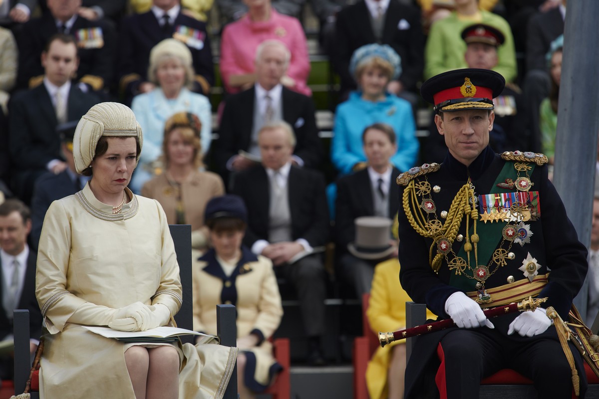 In this image released by Netflix, Olivia Colman plays Queen Elizabeth II and Tobias Menzies portrays Prince Philip in a scene from the third season of "The Crown." Britain's Prince Phi ...