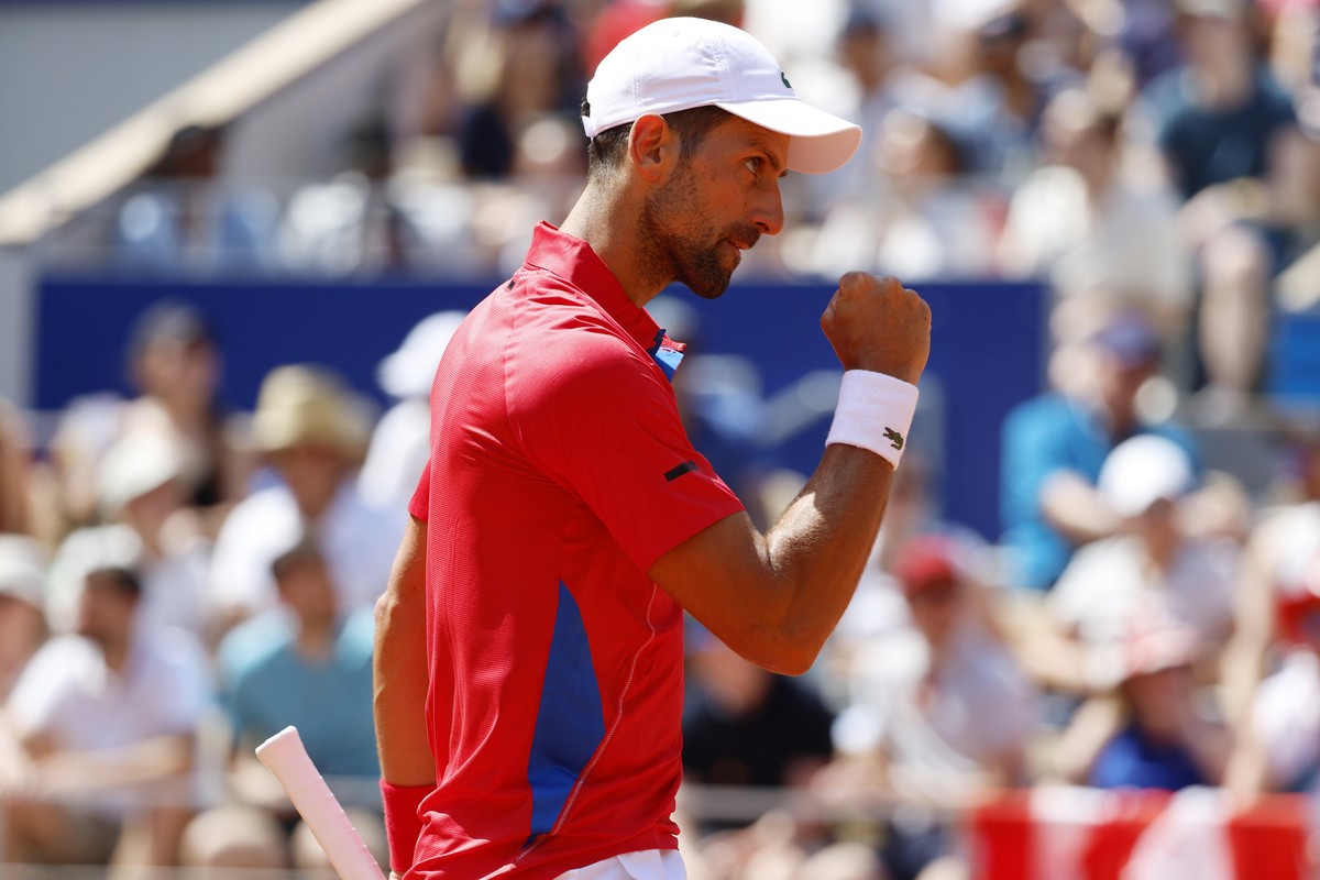 epa11505657 Novak Djokovic of Serbia reacts during the Men's Singles second round match against Rafael Nadal of Spain at the Tennis competitions in the Paris 2024 Olympic Games, at the Roland Gar ...