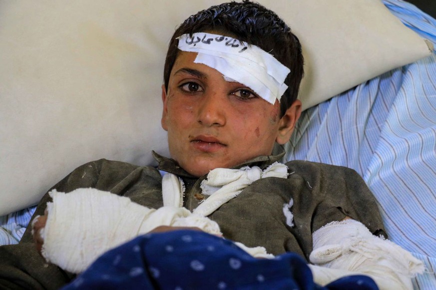 epa10027420 An injured victim of the earthquake receives treatment at a hospital in Paktia, Afghanistan, 22 June 2022. More than 1,000 people were killed and over 1,500 others injured after a 5.9 magn ...