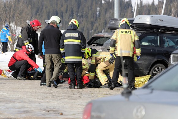 epa08208719 Firefighters and rescuers work at the scene of the fatal accident in Bialka Tatrzanska, south Poland, 10 February 2020. Two people died and two were severely injured after a roof fell on a ...