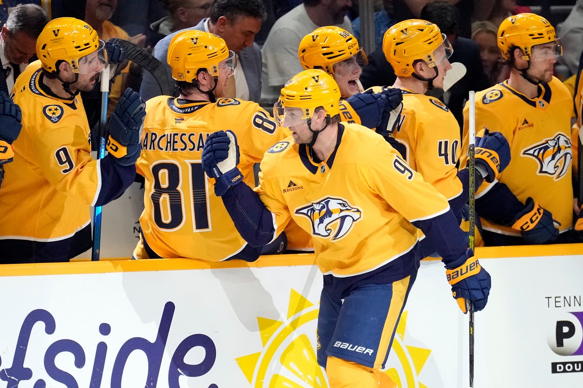 Nashville Predators center Steven Stamkos (91) is congratulated after scoring against the Minnesota Wild during the first period of an NHL hockey game Saturday, April 11, 2026, in Nashville, Tenn. (AP ...