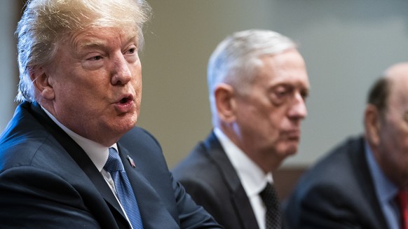 epa06828513 US President Donald J. Trump speaks with the media before meeting with members of his administration in the Cabinet Room of the White House Washington, DC, USA 21 June 2018. Trump spoke ab ...