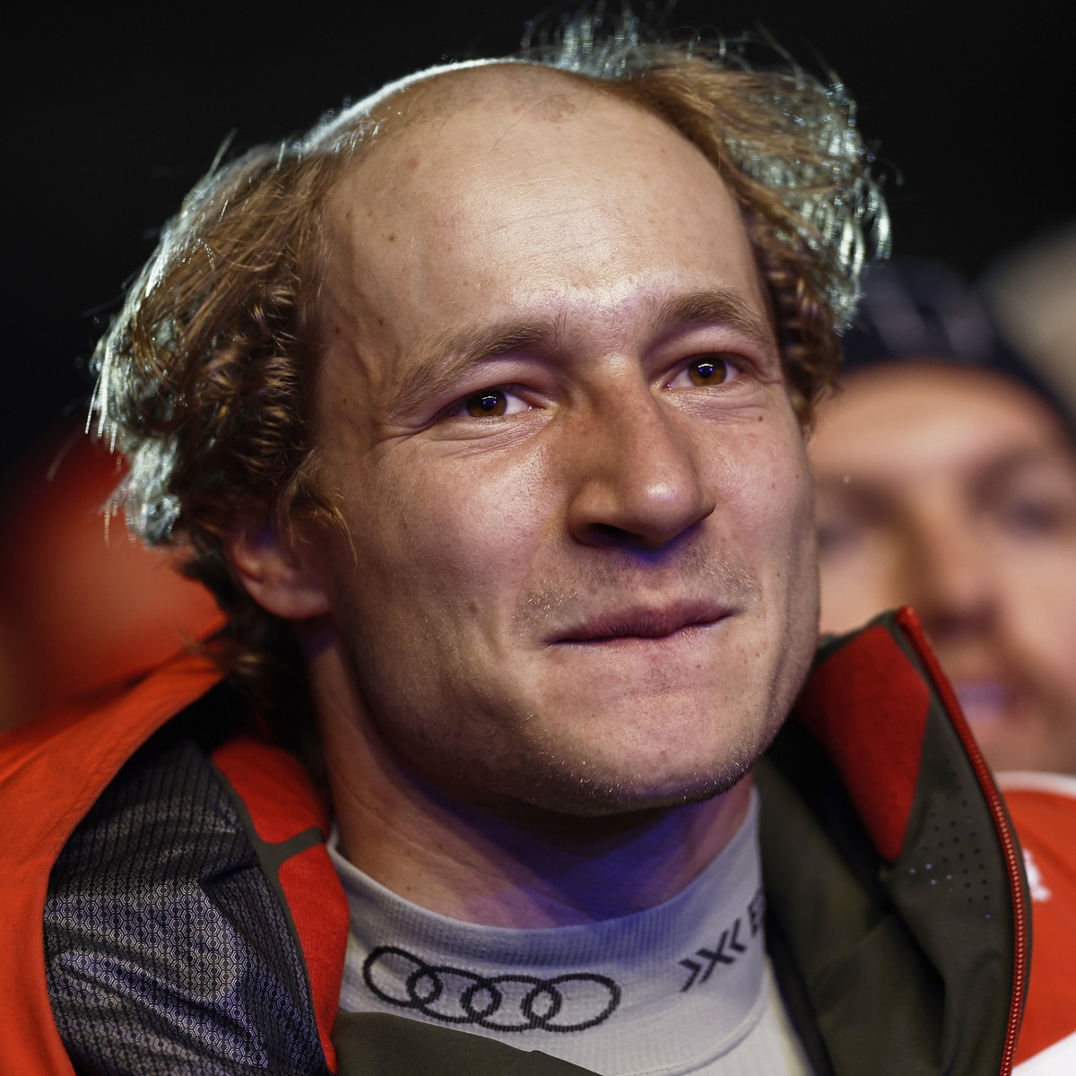 Switzerland's Marco Odermatt, with his hair partially shaved off, arrives at the medal ceremony for a men's downhill race, at the Alpine Ski World Championships, in Saalbach-Hinterglemm, Aus ...