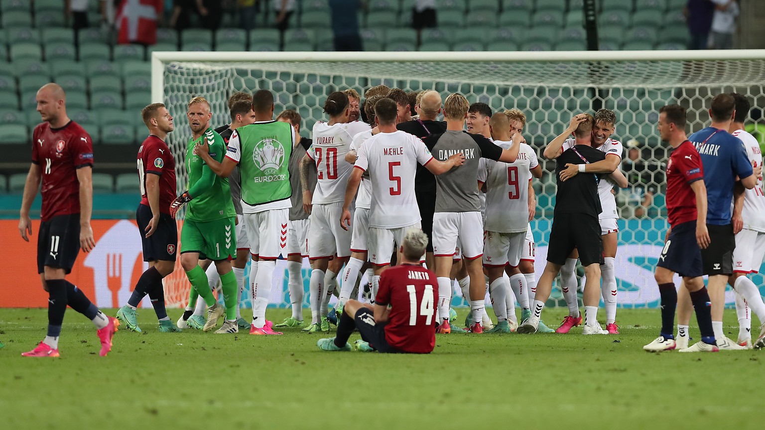 epa09320881 Players of Denmark celebrate after winning the UEFA EURO 2020 quarter final match between the Czech Republic and Denmark in Baku, Azerbaijan, 03 July 2021. EPA/Tolga Bozoglu / POOL (RESTRI ...