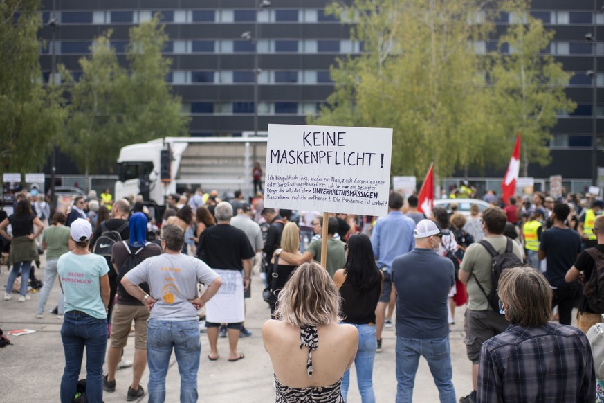 epa08681093 Demonstrators attend a protest against the Swiss government&#039;s measures to slow down the spread of the coronavirus disease (COVID-19), at the Turbinenplatz in Zurich, Switzerland, 19 S ...