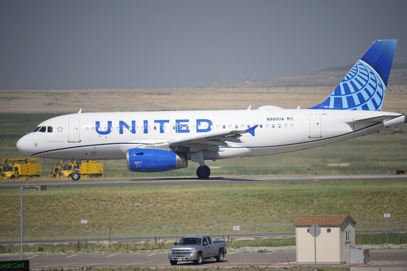 FILE - In this July 2, 2021 file photo, a United Airlines jetliner taxis down a runway for take off from Denver International Airport in Denver. United Airlines has been fined, Friday, Sept. 24, 2021, ...