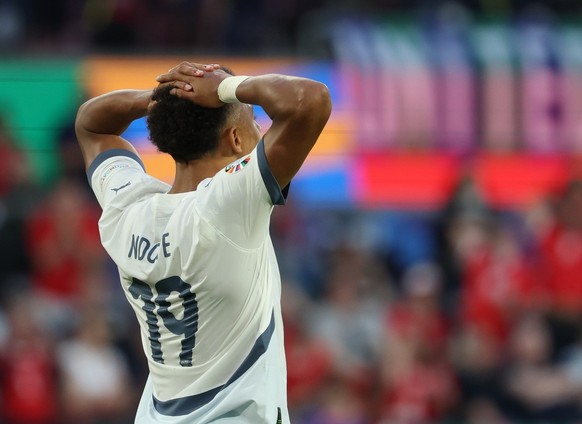 epa11423955 Dan Ndoye of Switzerland reacts during the UEFA EURO 2024 group A soccer match between Scotland and Switzerland, in Cologne, Germany, 19 June 2024. EPA/FRIEDEMANN VOGEL