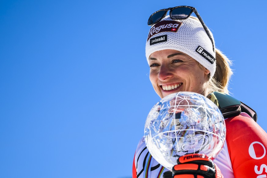 Lara Gut-Behrami of Switzerland winner of the women&#039;s super-g overall leader crystal globe trophy celebrates in the finish area at the FIS Alpine Skiing World Cup finals in El Tarter, Andorra, Th ...