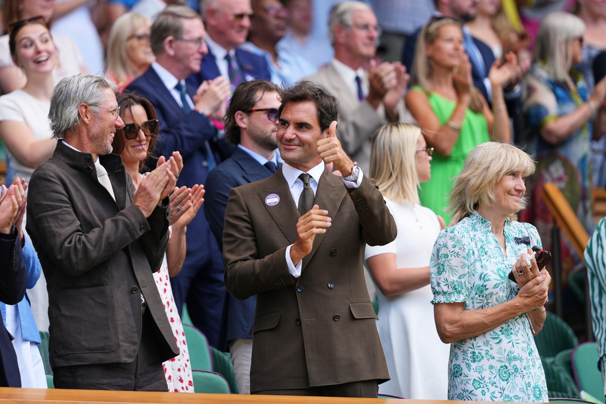 Former tennis player Roger Federer of Switzerland stands in the Royal Box on day eight at the Wimbledon Tennis Championships in London, Monday, July 6, 2026.(AP Photo/Kirsty Wigglesworth)
Roger Federe ...