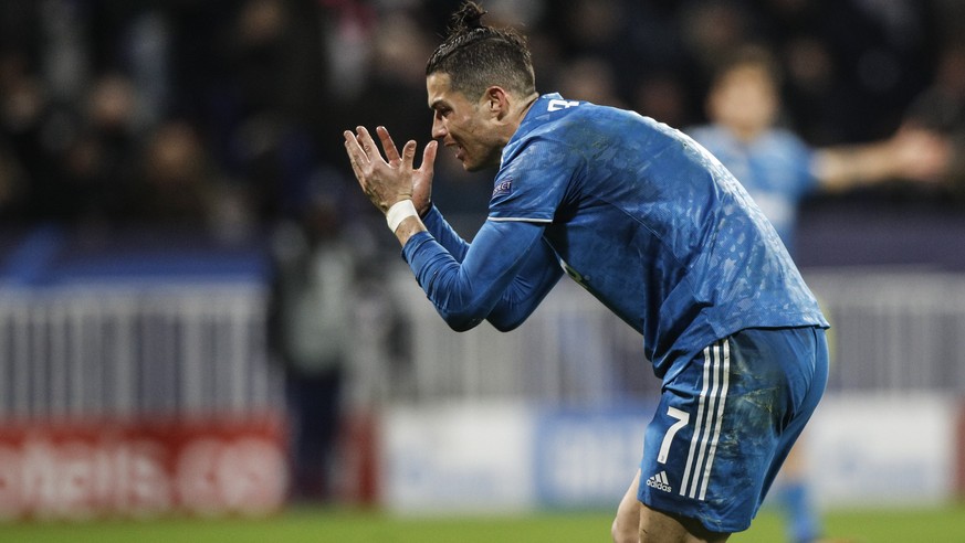 epa08250846 Cristiano Ronaldo of Juventus FC reacts during the UEFA Champions League round of 16 first leg soccer match between Olympique Lyon and Juventus FC in Lyon, France, 26 February 2020. EPA/YO ...