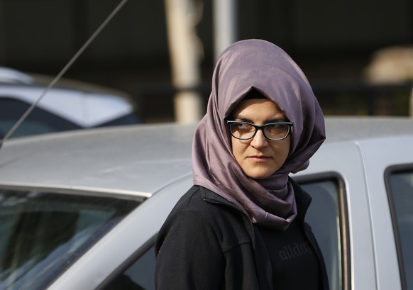 A woman who identified herself as Hatice A., the Turkish fiancee of Saudi journalist Jamal Khashoggi, walks outside the Saudi Arabia consulate in Istanbul, Wednesday, Oct. 3, 2018. Khashoggi, who has  ...